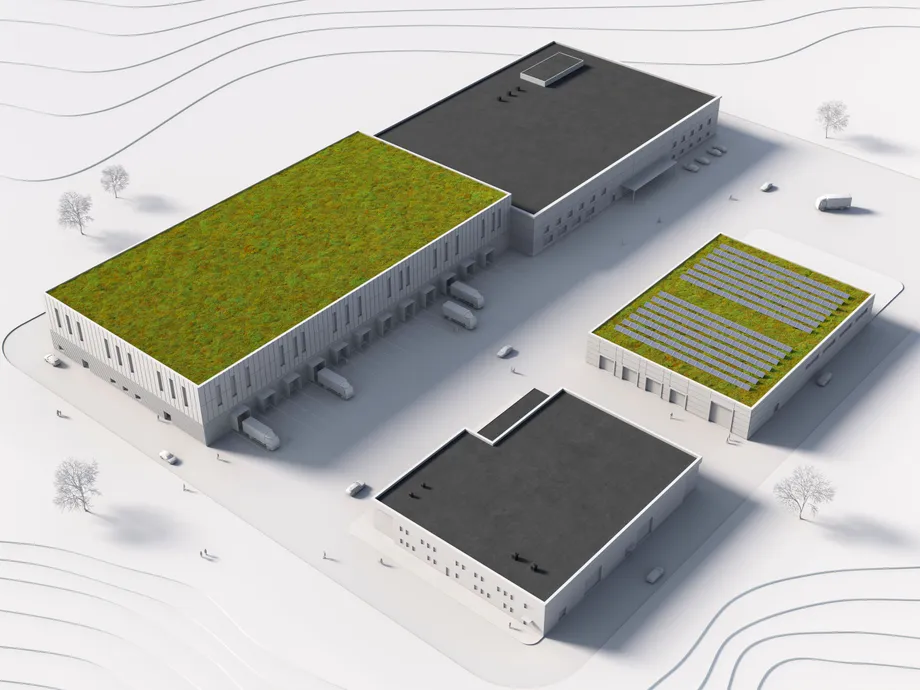 En arkitektmodel af tagpap på en industribygning med grønne tage og solcelleløsninger.